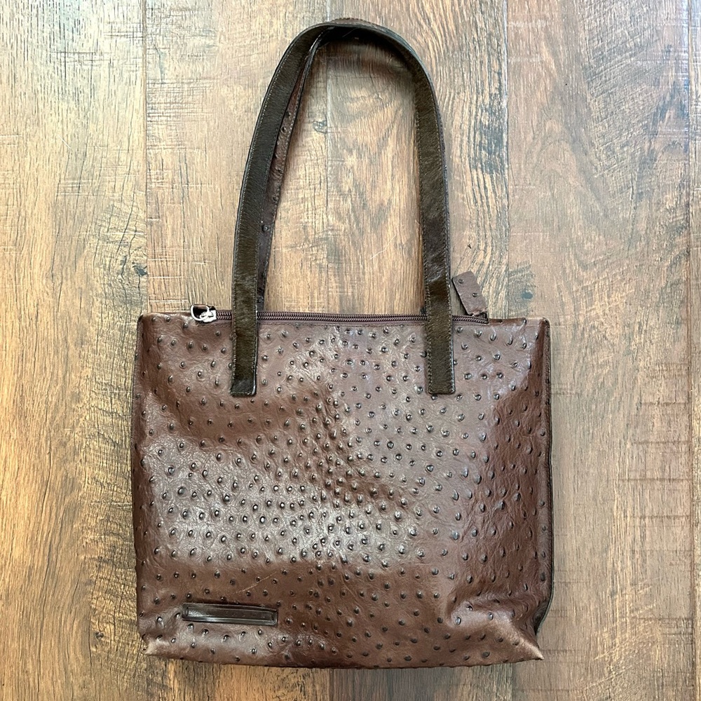 FALOR textured brown leather bag with calf hair accents